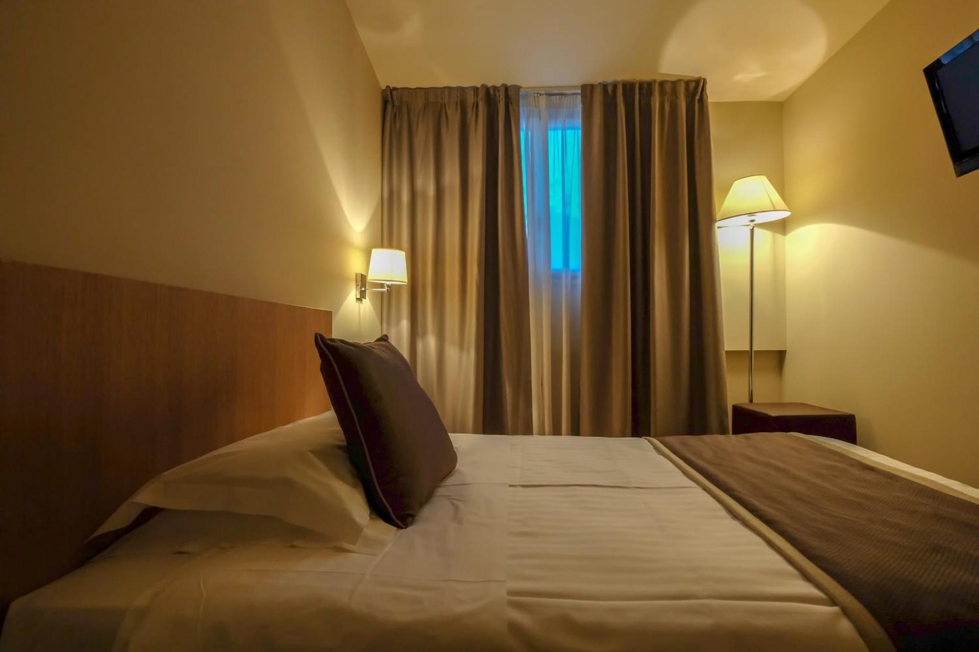 Hotel De La Ville Річчоне Номер фото